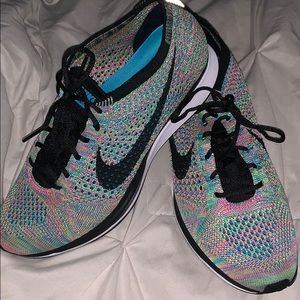 Nike fly knit racer tennis shoes (size 8.5 womens)